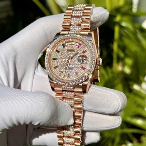 a hand holding a certificate with a gold watch